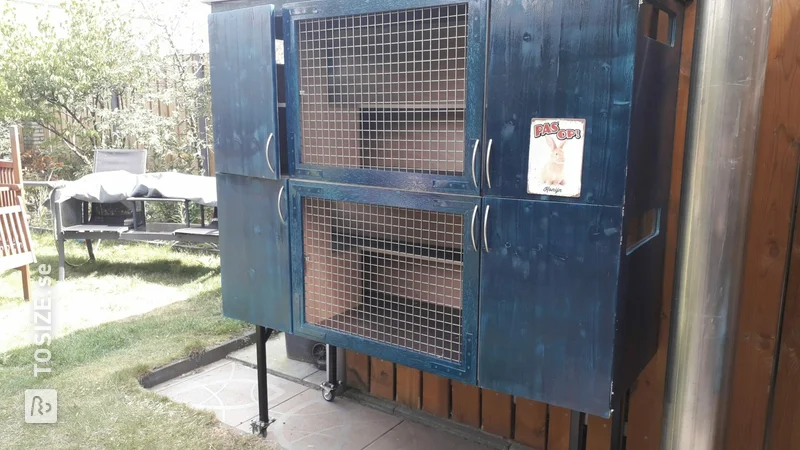 Homemade double rabbit hutch at height, by Kim and Roy