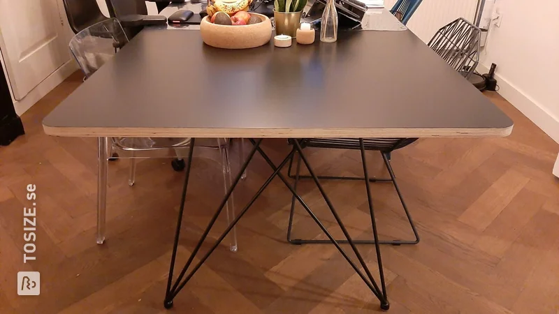 Black painted plywood dining table, with wooden edge, by Yvonne