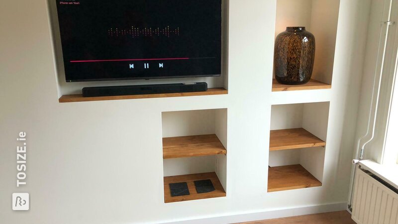 Cinema wall with pine shelves, by Marvin
