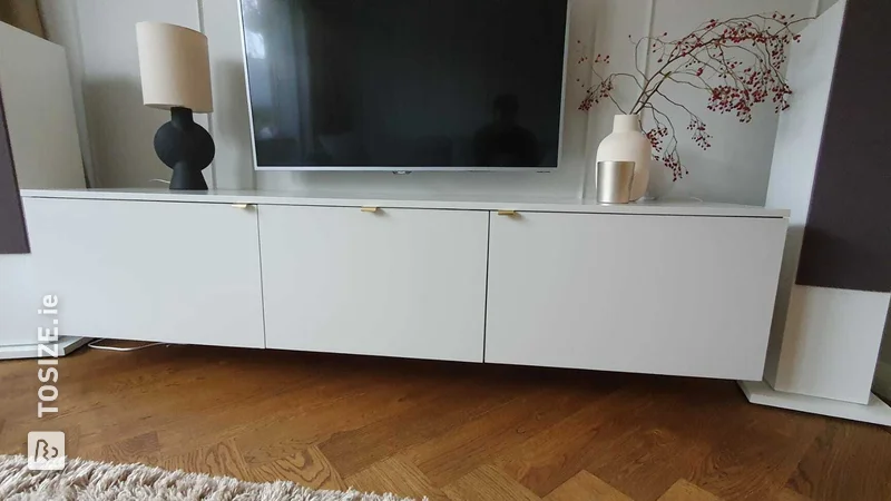 Homemade floating TV furniture made of plywood and MDF, by Roel