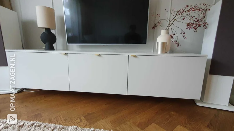 Homemade floating TV furniture made of plywood and MDF, by Roel