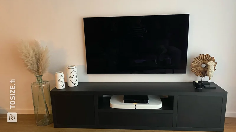 Custom made TV cabinet in black oak quarters, by Sascha