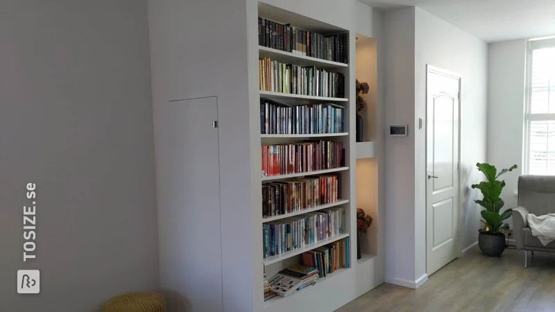 Staircase cupboard/Bookcase custom made from MDF, by Harry