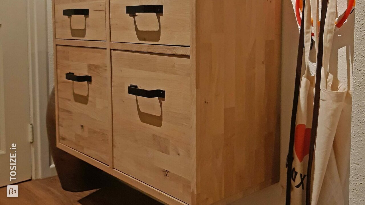 Hanging chest of drawers in rustic oak, by Hans