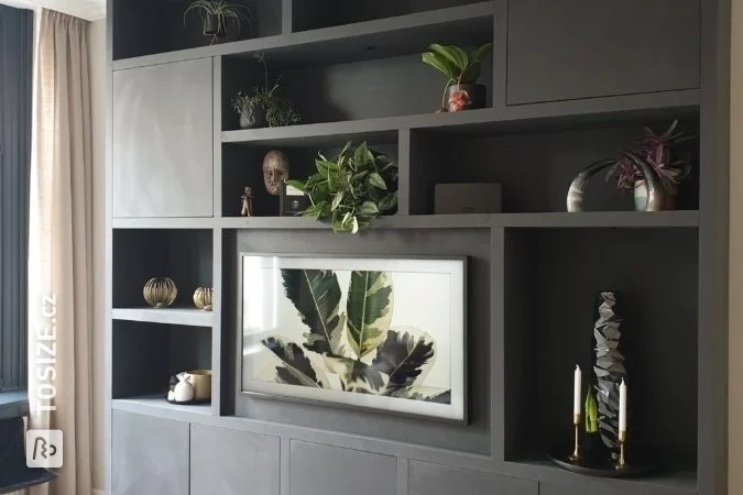 A custom TV cabinet made of MDF Black V313, by Koen