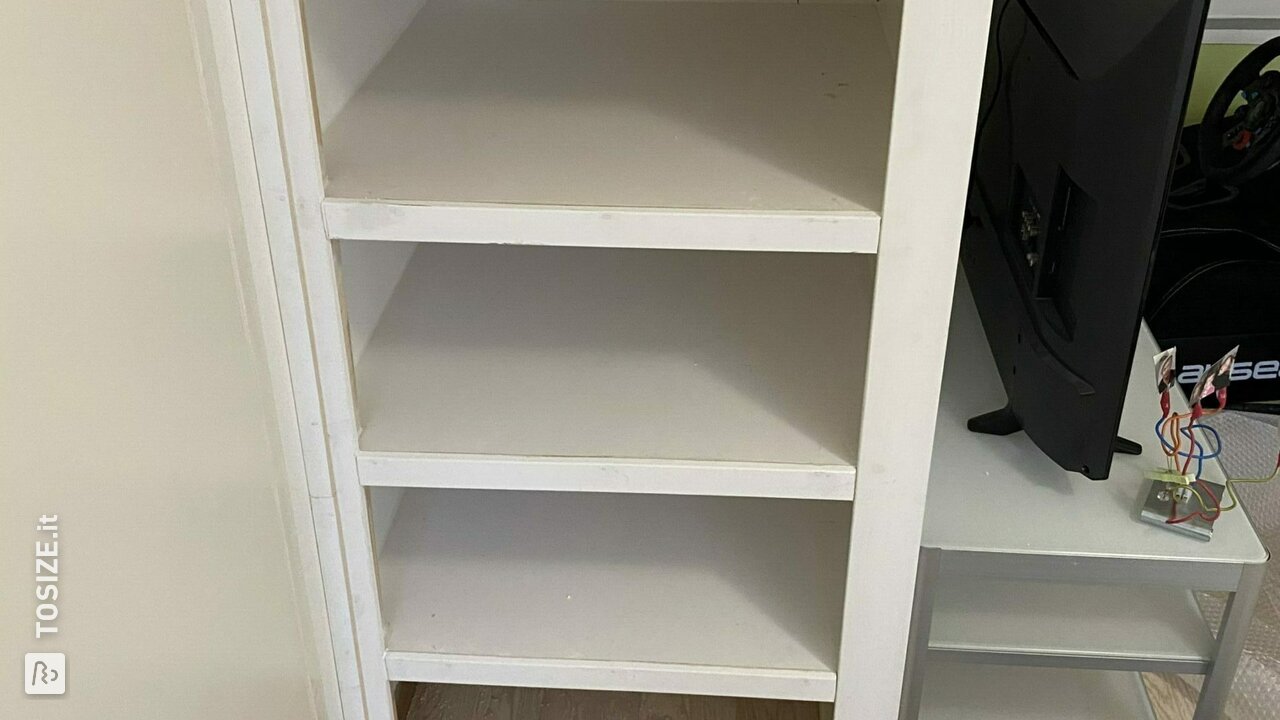 Creating storage space in a niche by extra shelves, by Jesse