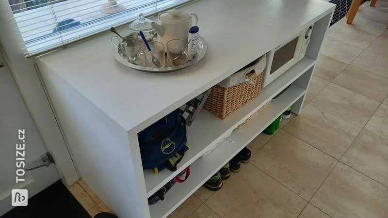 Custom made shoe cabinet in the kitchen, by Vanessa