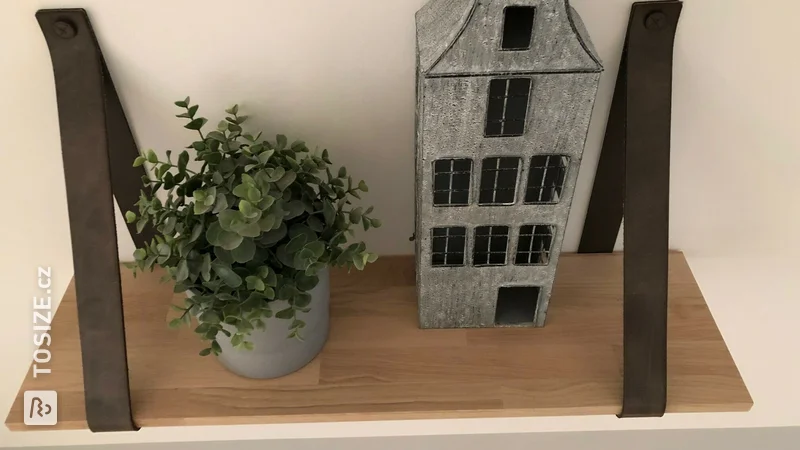 Solid oak wall shelf with leather supports, by Stefan