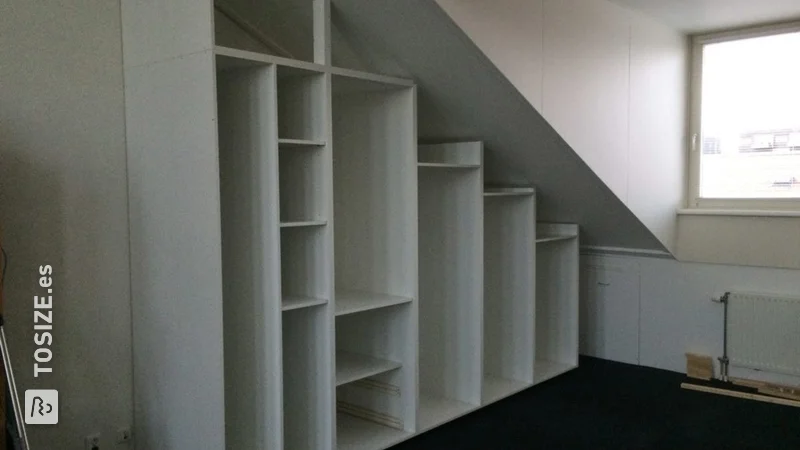 Storage cupboard for under the sloping attic roof, by Vincent