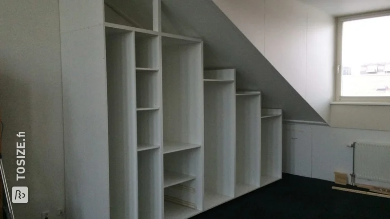 Storage cupboard for under the sloping attic roof, by Vincent