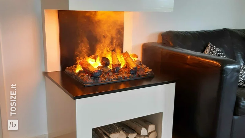 Sleek white fireplace surround made of MDF, by Niek