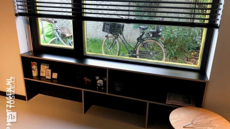 A windowsill with a bookcase