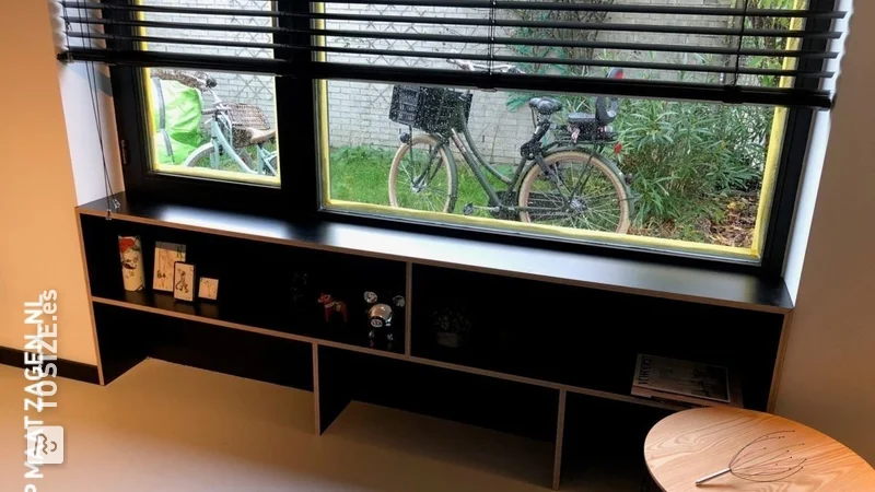 A windowsill with a bookcase