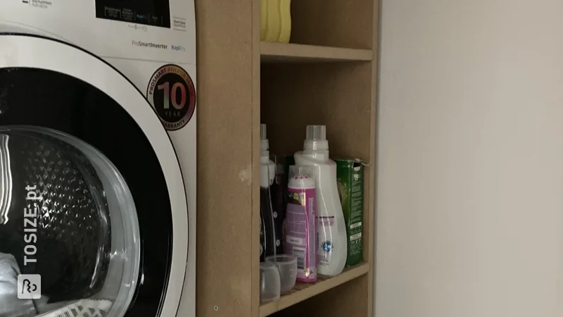 Custom MDF cabinet in laundry room, by Leonoor