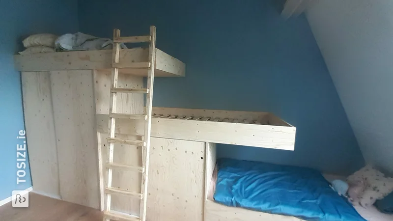 Bunk beds with closet space, by Jan