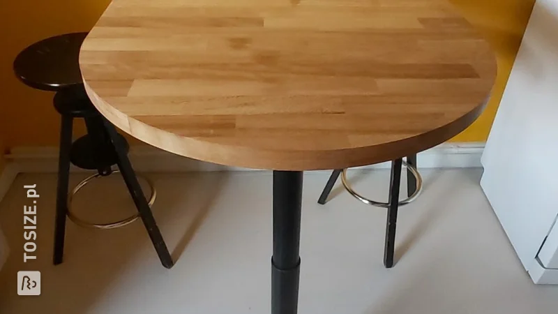 Solid Iroko bar table in unique shape, by Roy