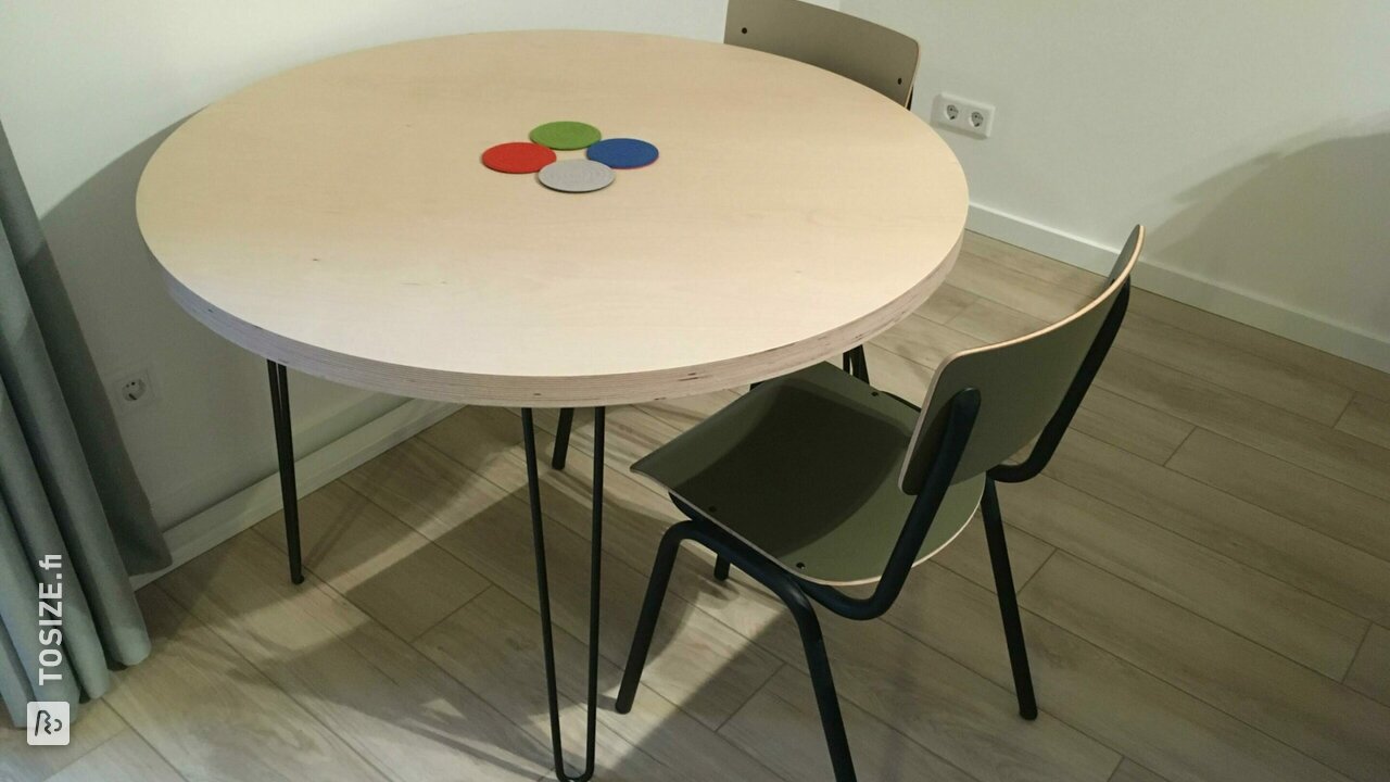 Round table with sleek plywood birch edge, by Luc