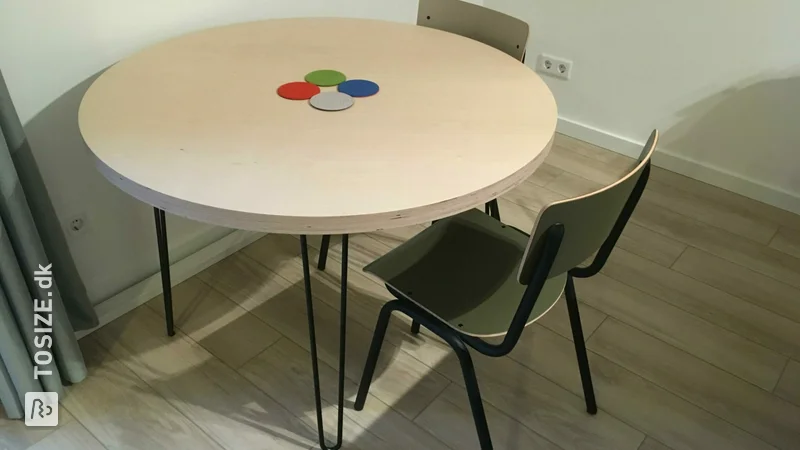 Round table with sleek plywood birch edge, by Luc