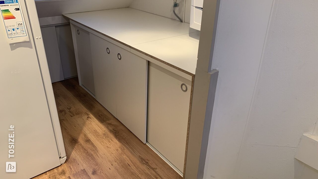 Homemade washing machine cabinet made of chipboard
