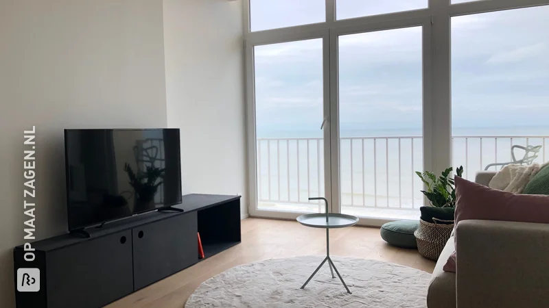 TV cabinet made of MDF Black for an existing chimney