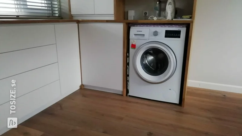 Homemade storage cupboards for the laundry room, by Jac