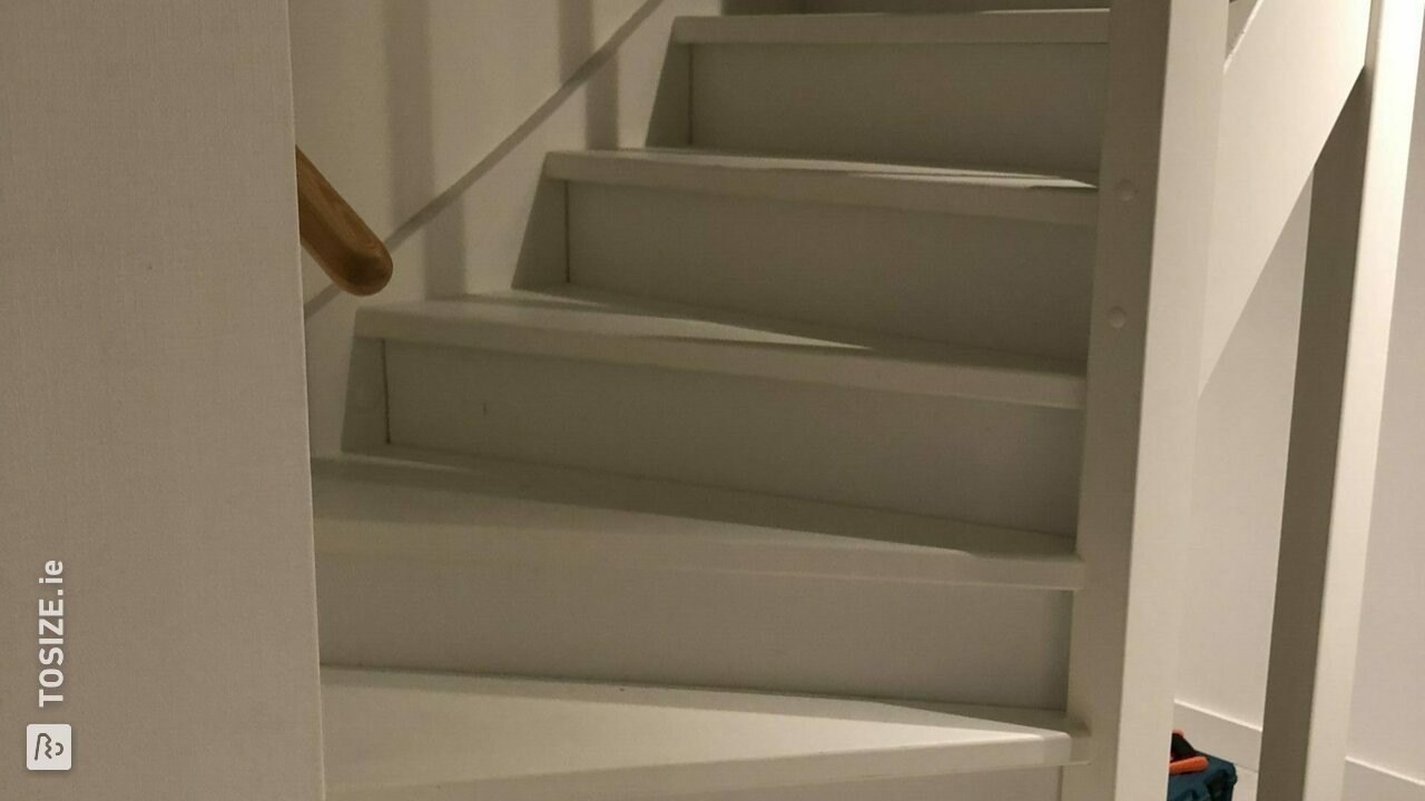 Closing stair treads with primed poplar plywood, by Koen