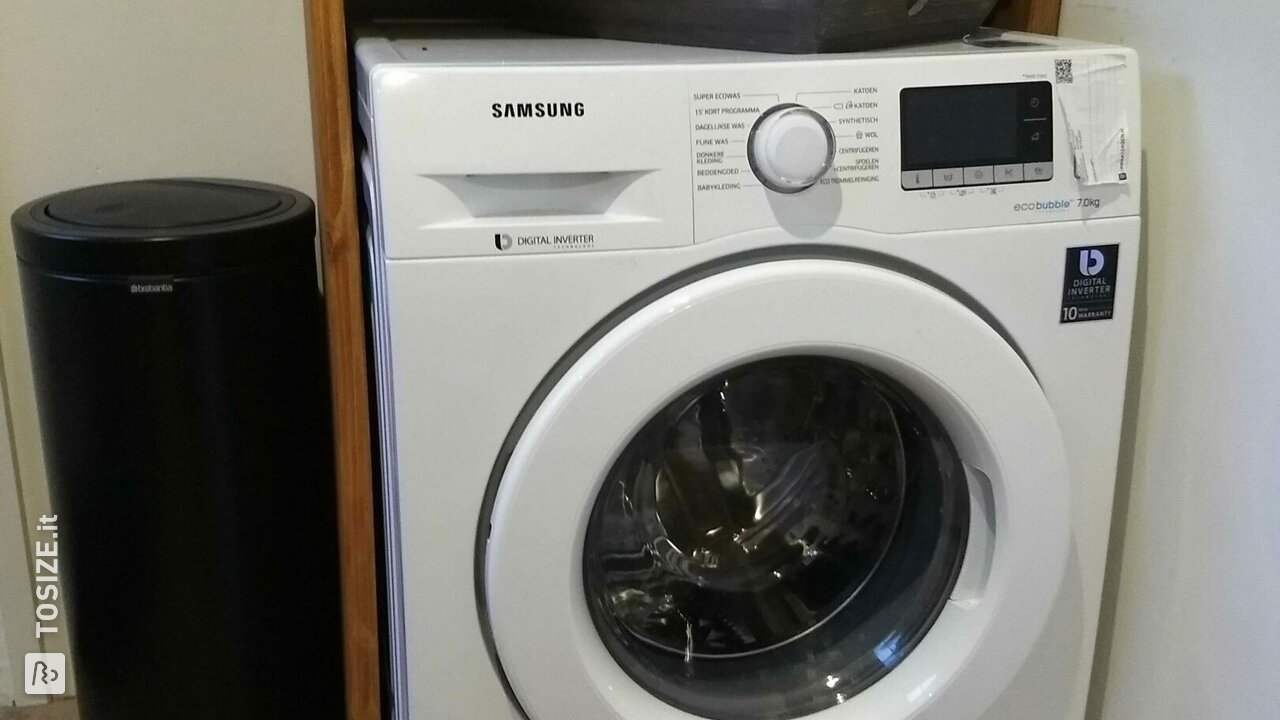 Washing machine enclosure made from pine timber panels, by Jaco