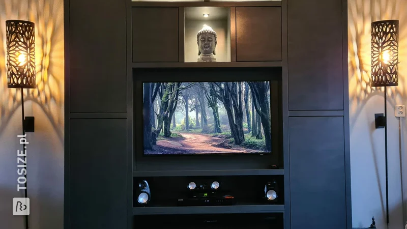 Shelf cabinet with built-in TV and decorative fireplace, by Johan