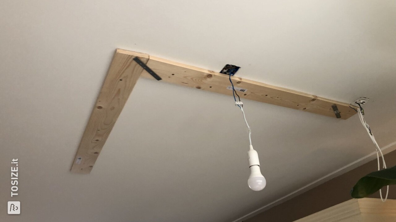 Montare una lampada industriale pesante su un soffitto in gesso