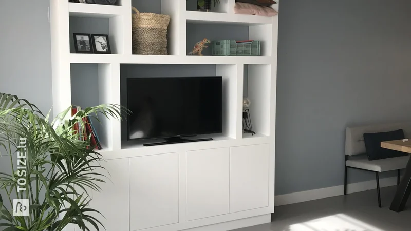 A TV compartment cabinet precisely tailored, by Ineke