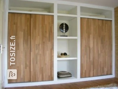 Built-in wardrobe with custom oak doors, by Bram
