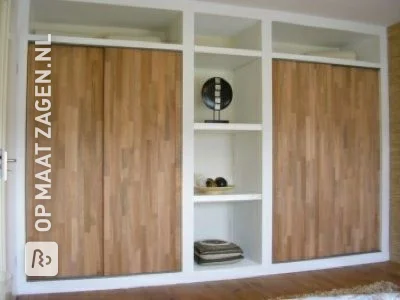 Built-in wardrobe with custom oak doors, by Bram