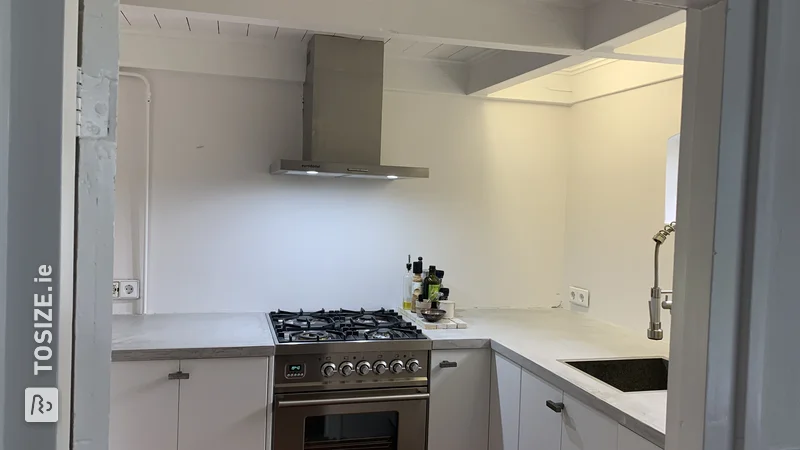 Custom birch plywood fronts for an IKEA kitchen, by Laura