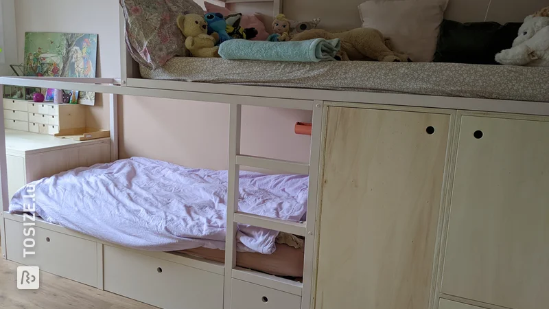 Homemade loft bed with integrated desk, by Femke