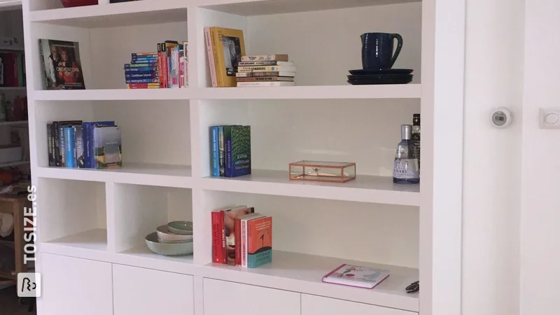 Multifunctional white sideboard and bookcase, by Michiel