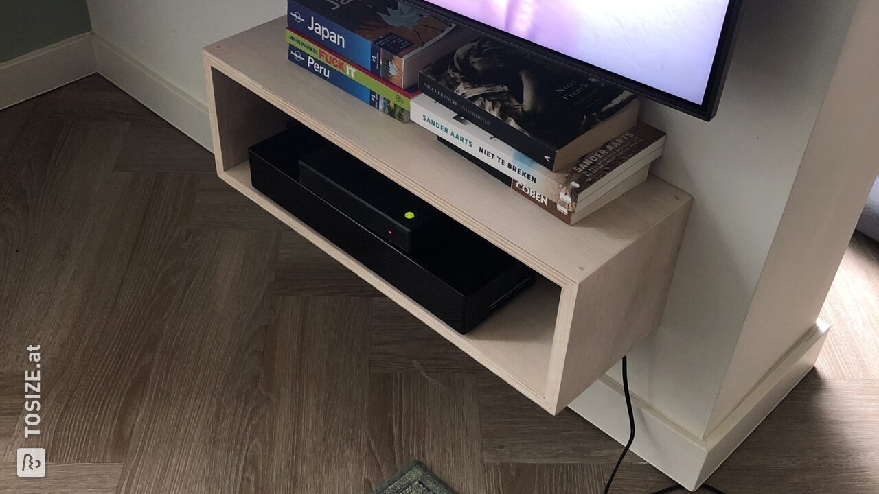 Dylan baute eine Fußbodenheizung und einen Fernsehschrank um