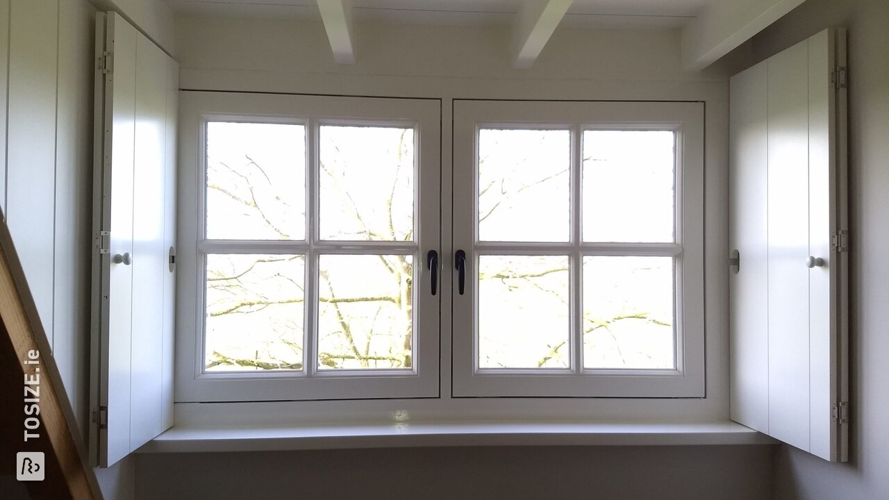 Country style interior shutters in the dormer, by Gerard