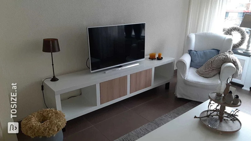 Homemade TV cabinet of MDF lacquer support with oak flaps, by Ellen