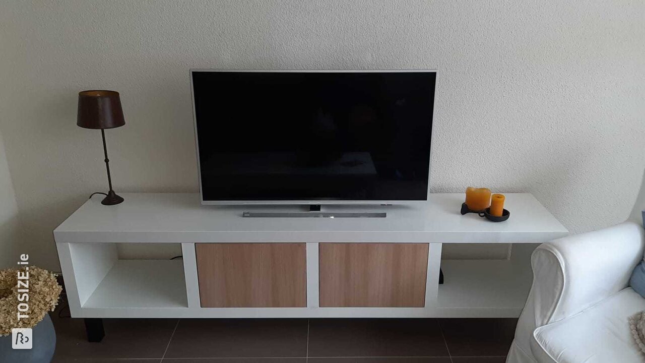 Homemade TV cabinet of MDF lacquer support with oak flaps, by Ellen
