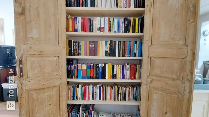 Shelves for bookcase from old panel door cupboard, by Harry