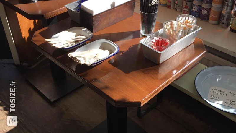 Custom restaurant table with sleek milled edges, by Joris