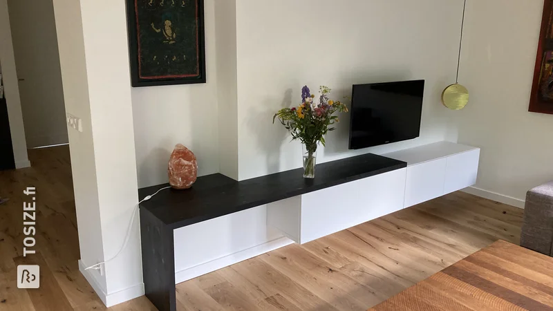 IKEA BESTA hack: custom extension of TV cabinet with dark panels, by Willem