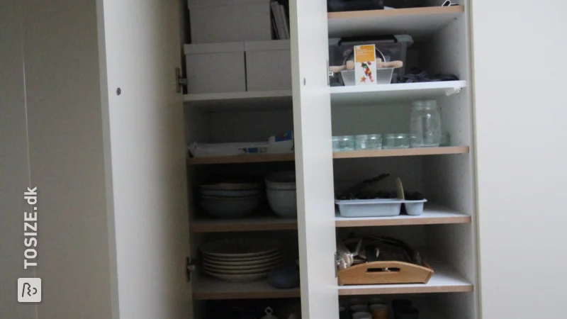 Adding extra cupboard shelves to existing cupboard in the attic under a sloping roof, by Maarten