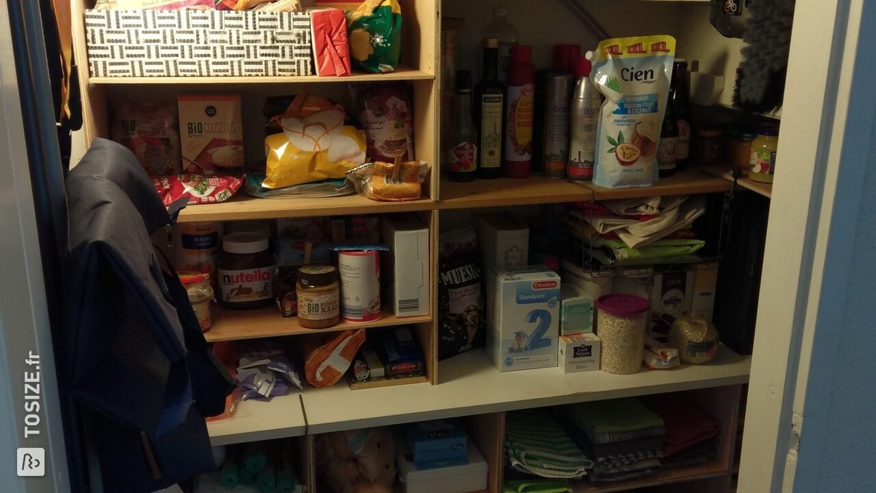 Homemade pantry under stairs made of plywood, by Jimme