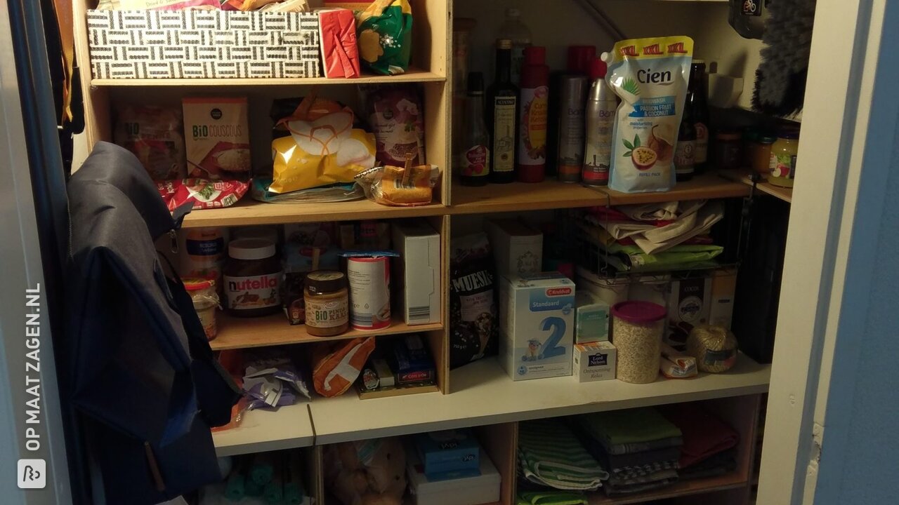 Homemade pantry under stairs made of plywood, by Jimme