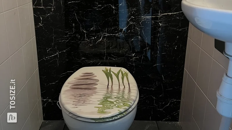 Wall-mounted toilet made of luxurious wall panels, by Ronald