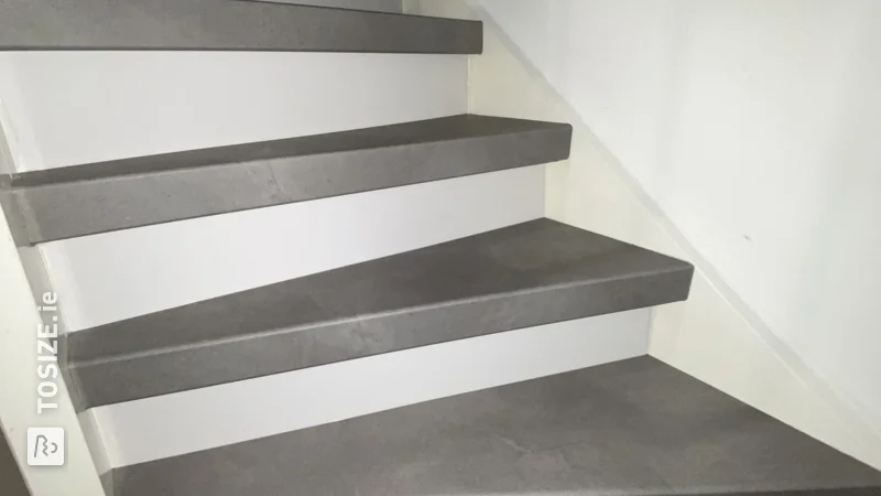 Closing an open staircase with custom-ordered risers, by Montana
