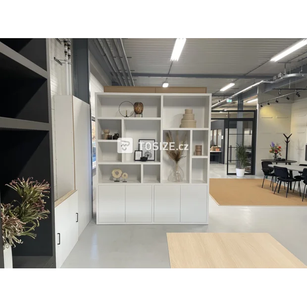 White cupboard wall with doors and open compartments