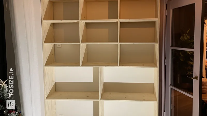 A large wall cupboard with plenty of storage space made of Finnish spruce, by Barry