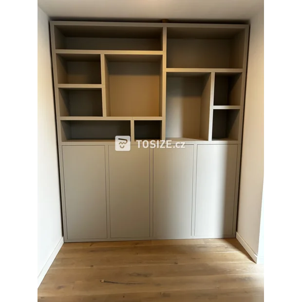 Beige cupboard wall with open compartments and doors